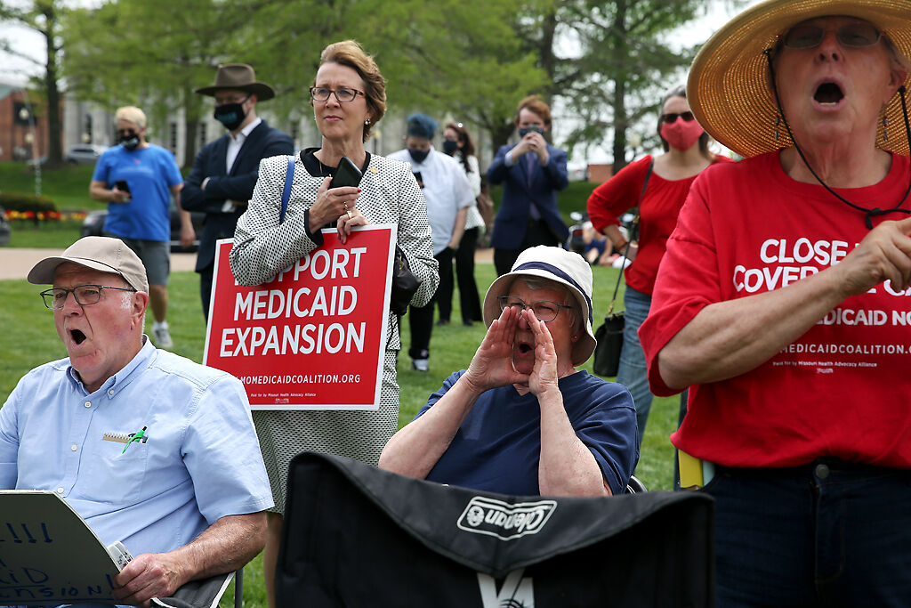 Ken Horgan, Maxine Horgan and Barbara Nyden yell “Boo!”